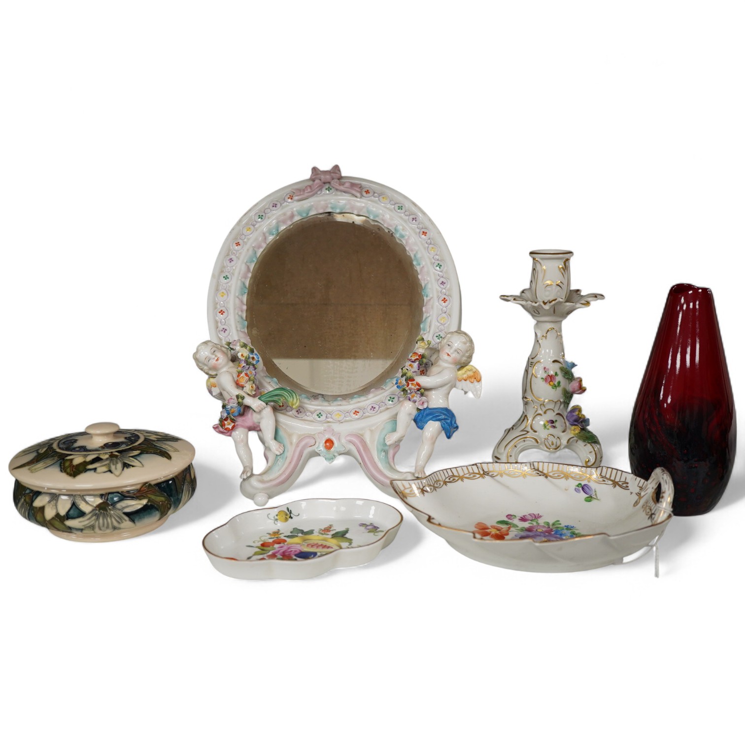 A Dresden style mirror, a Moorcroft pot, Doulton flambé vase and other ceramics, tallest 30cm